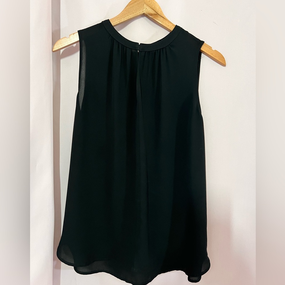 Silk Blouse  no sleeves. Black. From The Loft.